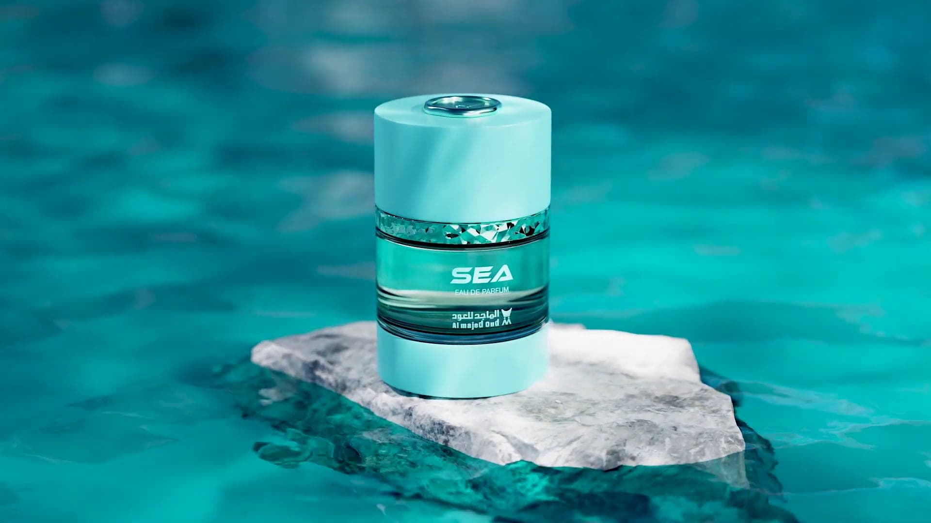 Turquoise product container standing on a block of ice in clear blue water